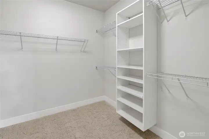 Walk-in closet with built in shelving (Photos from lot 9B)