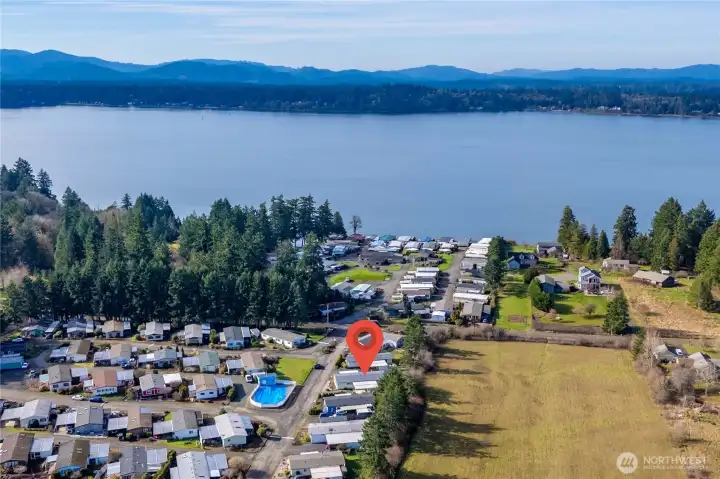 Enjoy the best of seaside living in this waterfront 55+ community with Puget Sound just moments away, including access to the community’s private beach for peaceful strolls and breathtaking views.