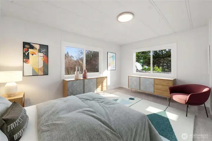 Fourth bedroom features NEW LVP flooring, new lighting, new double-paned vinyl windows, and a large closet for comfortable, move-in ready living.   (photo virtually staged)