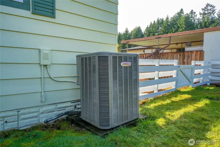 Well-maintained exterior and heat pump system provide comfort and energy efficiency year-round.