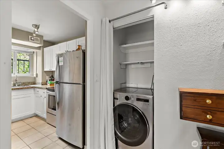 Kitchen and laundry with recently purchased all-in-one washer and dryer