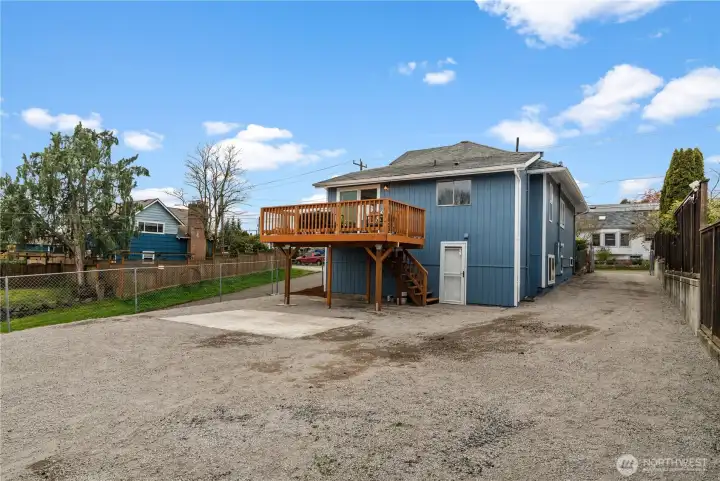 Large driveway connect to the back yard