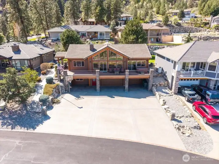 3-car garage plus additional parking in front.