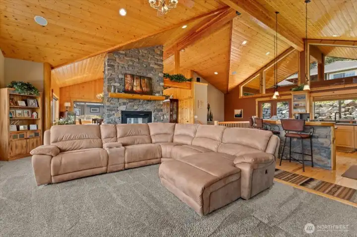 Vaulted ceilings with Knotty Pine Tongue-and-Groove paneling.