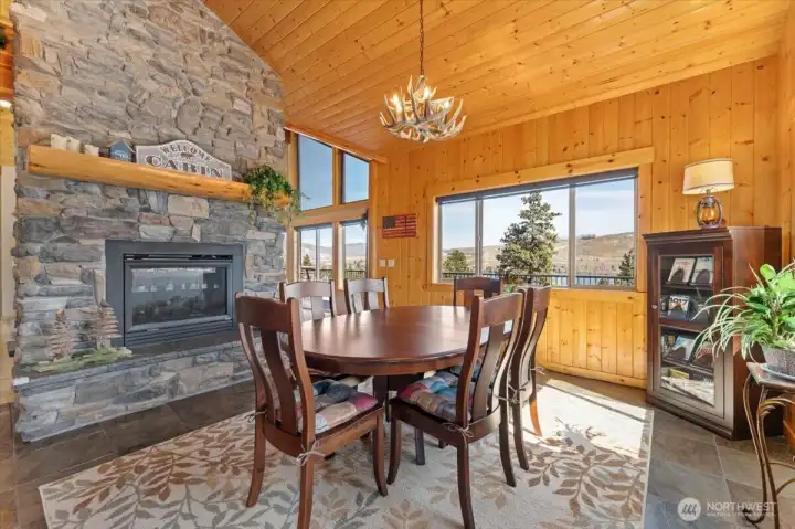 Dining room with the double-sided propane fireplace.