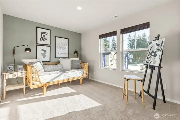 Spacious bedroom.  Finishes and colors may vary.