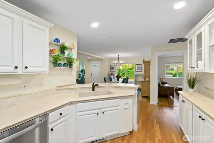 Well-appointed kitchen with easy flow to dining and living areas