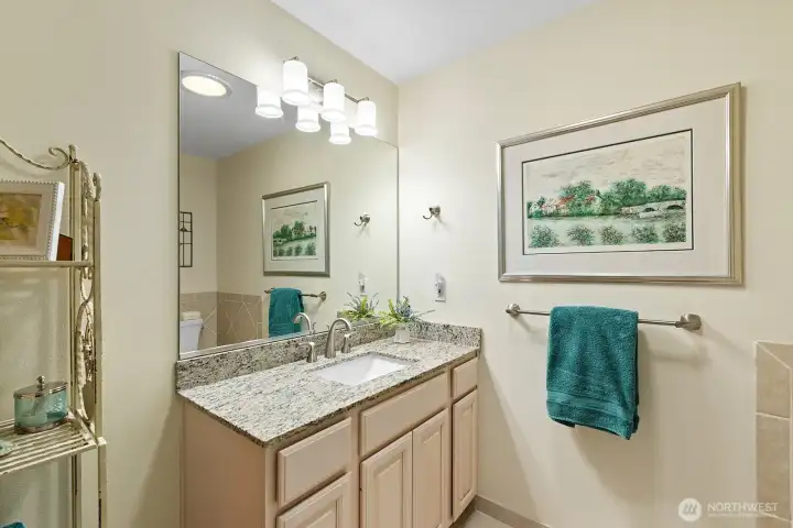 Bright second full bathroom serving guest bedrooms