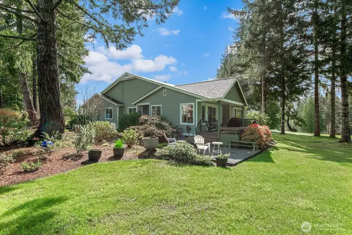 Enjoy serene surroundings with mature landscaping and well-kept grounds