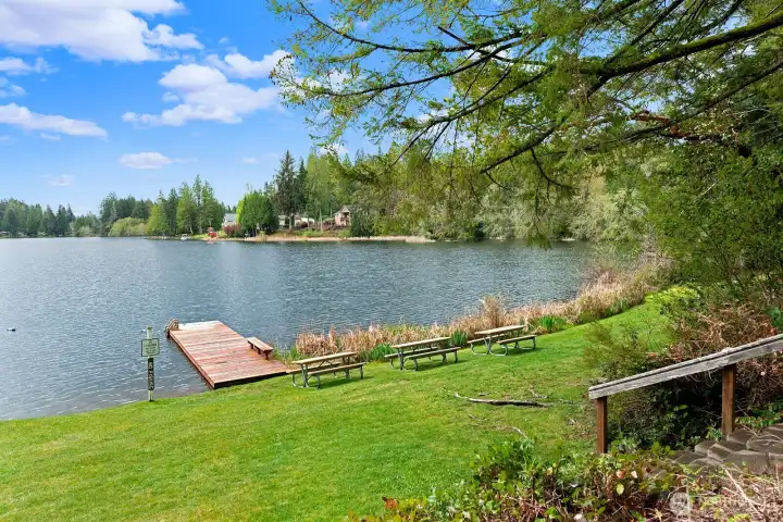 Spend the day at the community beach with  dock and designated swim area