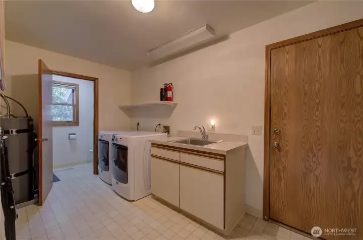 Utility Room with door leading to the garage