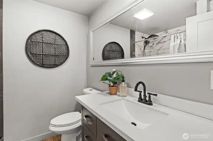 Second bathroom newly retiled bath