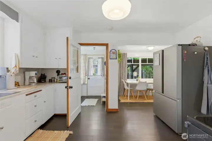 Cozy dining nook located off the back of the kitchen.
