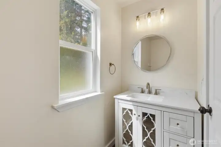 Powder room (half bath) on first floor