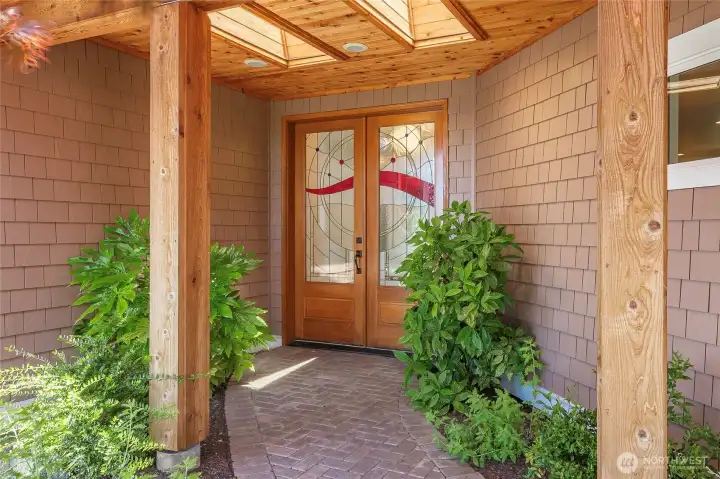 Covered entry with beautiful custom,stained glass door Covered entry with beautiful custom,stained glass door