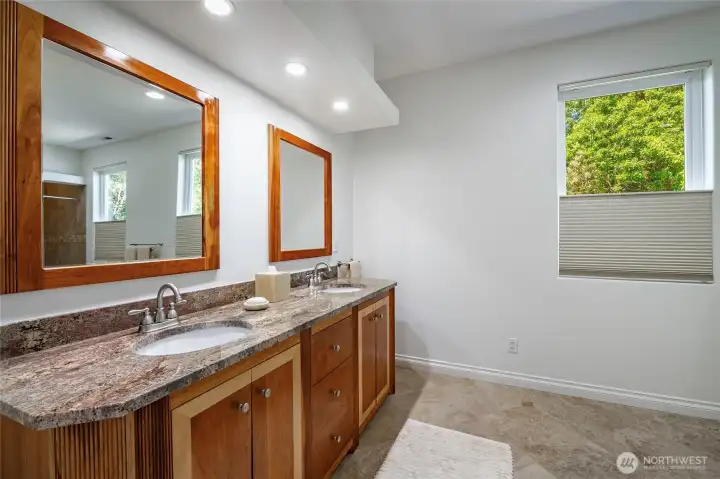 Primary bath, custom cabinets, granite counters, double sinks Primary bath, custom cabinets, granite counters, double sinks