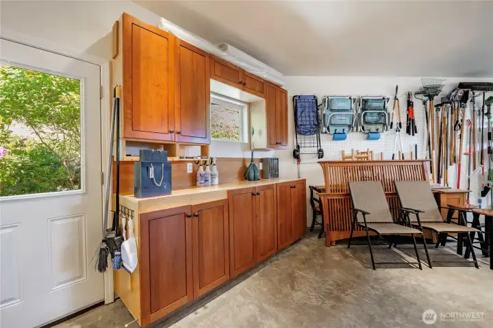 Additional built-ins in garage and man-door to back yard. Additional built-ins in garage and man-door to back yard.