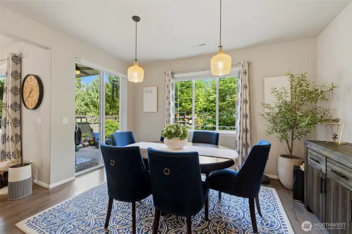 Dining area is just off of the kitchen with a slider to your covered patio!
