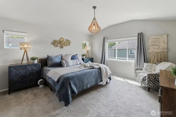 The large primary suite has is detached from the other bedrooms