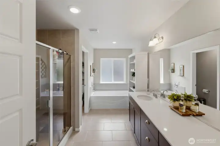 Primary bathroom with shower and tub