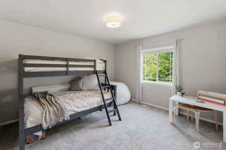 Bedroom that looks out onto the backyard