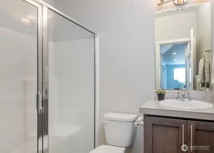 One of the home's most desirable features is the main-floor bedroom paired with a nearby ¾ bathroom, offering the convenience of a shower on the main level and endless possibilities for guests, multigenerational living, or a dedicated office space.