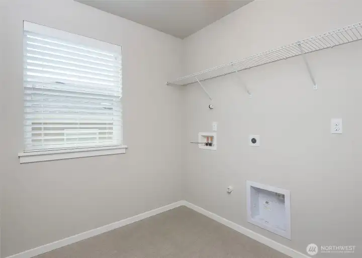 Spacious and convenient  second floor laundry.