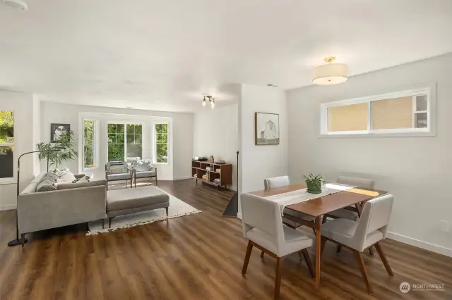 Well lit dining area and open flow living space