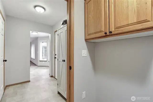 Laundry room separate off garage.