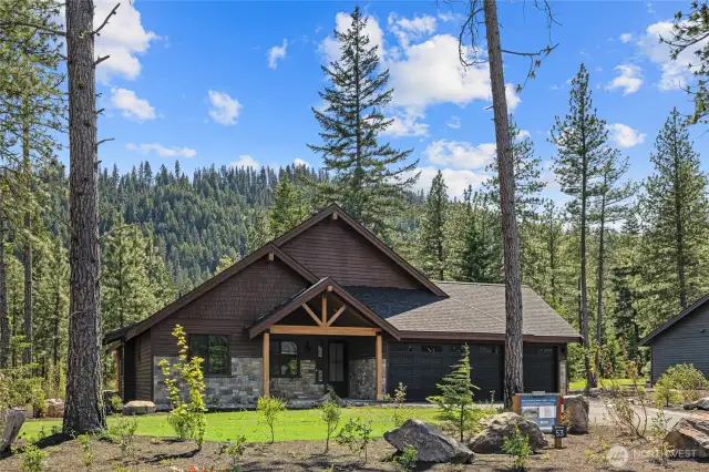 This large homesite backs up to Domerie Park with plenty of privacy!