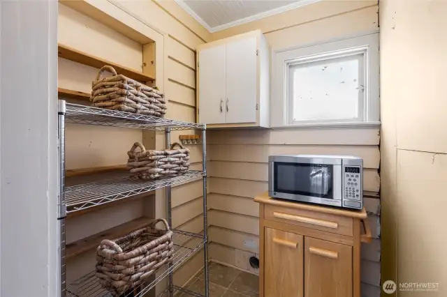 Pantry. Has and dryer vent outlet covered over. May have been a laundry area at one point.  Would make a great upstair laundry should you make the downstairs an ADU