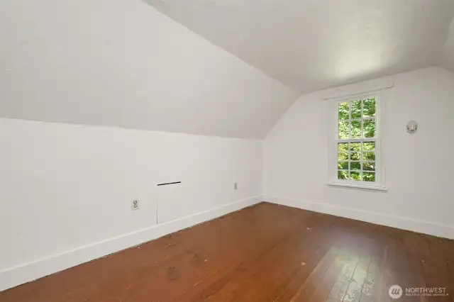 One of two upper bedrooms.