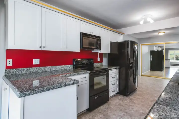 Kitchen also has Breakfast Nook with Large Hidden Pantry behind mirrored doors