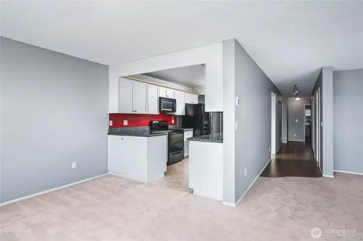From Dining Area/Living Room looking towards Kitchen and Bedrooms/Entry