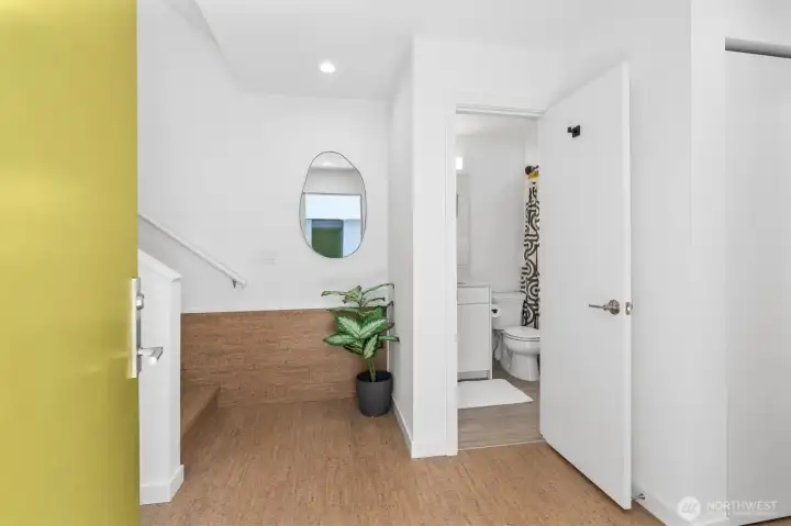 Entry.  Ground floor bedroom to your right & guest full bath straight ahead.