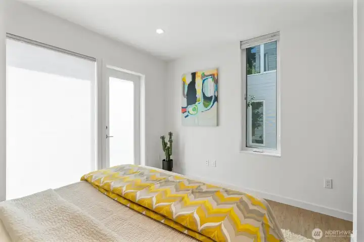 Guest bedroom or Home Office on ground floor.  Patio door to outside.