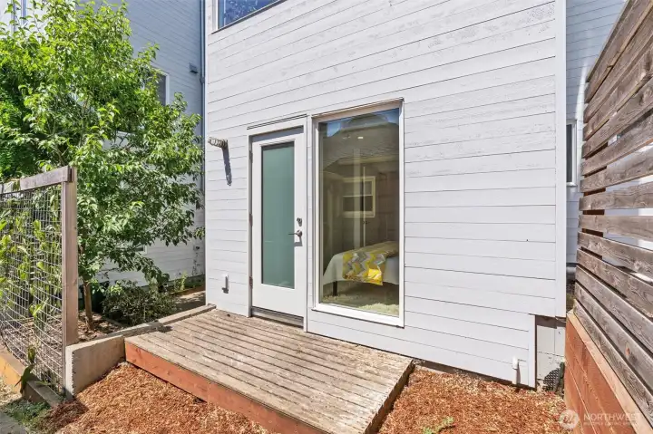 Patio area outside ground level bedroom / home office.