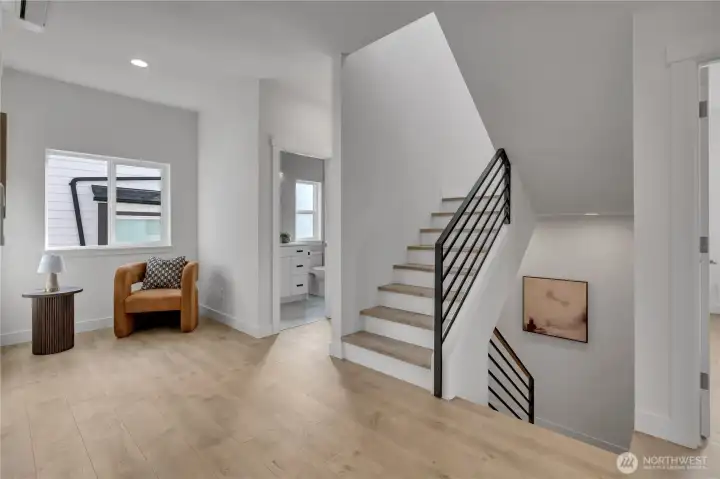 Half bath near stairs to rooftop deck.