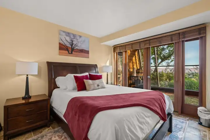 2nd lower level bedroom with atrium, hot tub and yard access