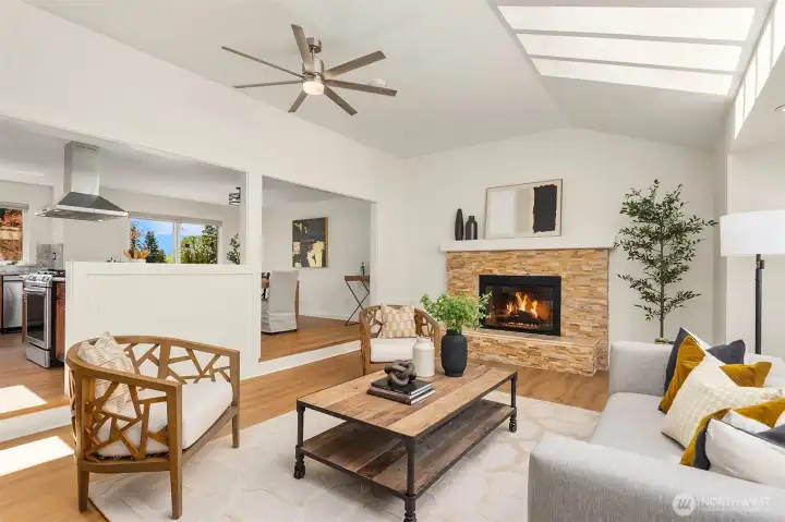 Skylights, wood burning fireplace, new flooring- move right in!