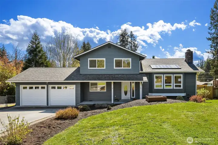 Newer roof, exterior paint and decks! Move right in!