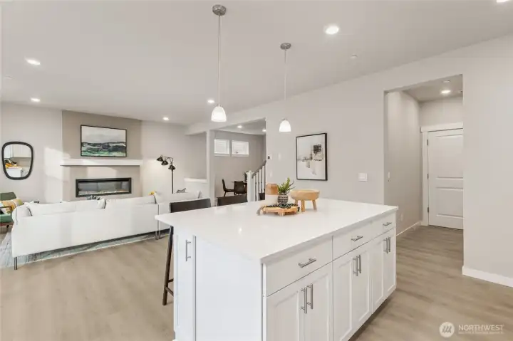 Kitchen open to main living space. Photo's are for representational purposes only. Colors and finishes may differ.