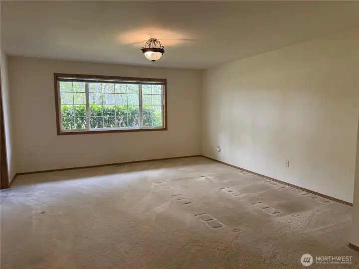 Primary bedroom with generous walk in closet and en suite bath