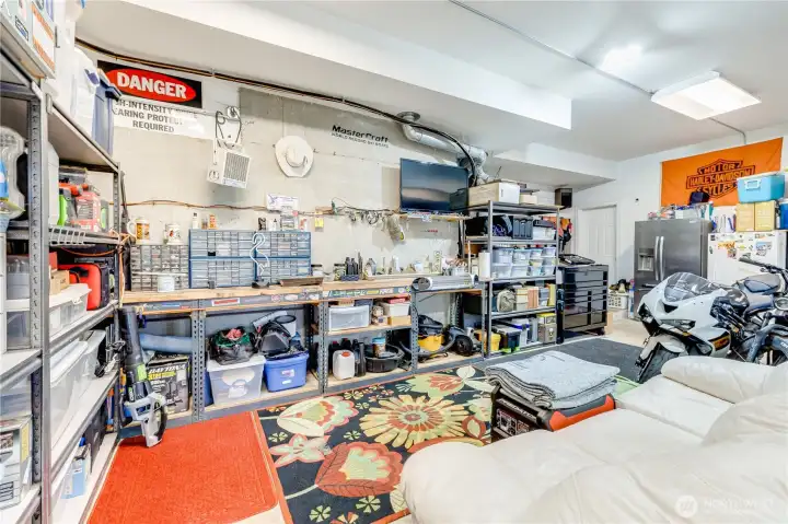 A sneak peek at the  forward section  over-sized 3+ car garage. 3+ cars 'live' in here on a regular basis.