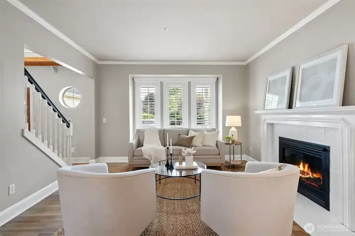 Crown molding and fine woodwork create warmth, elegance, and character throughout.