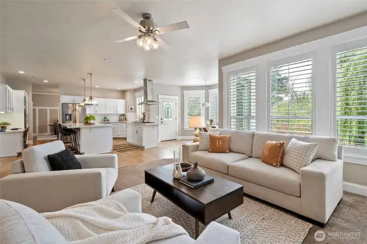 Open sightlines connect the kitchen seamlessly to the surrounding living spaces.