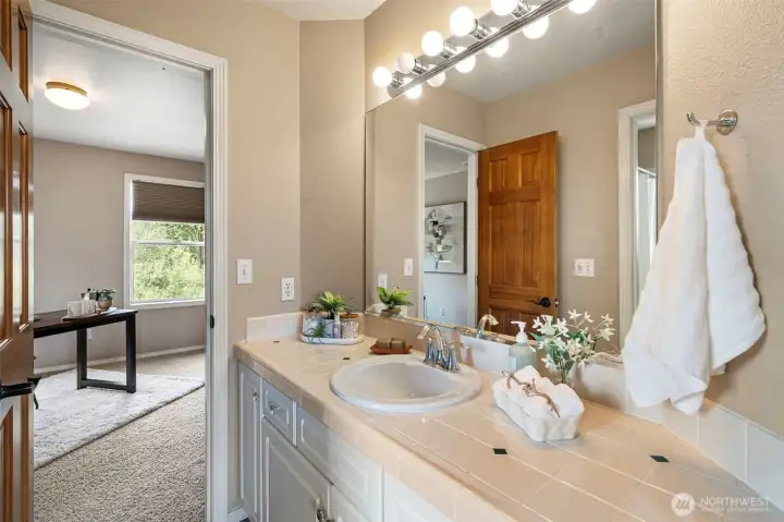 Full bath with shower/tub just off of this room.