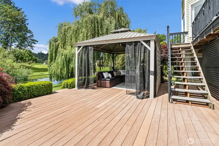 The covered gazebo offers the perfect place to relax, entertain, or simply enjoy the surrounding beauty.