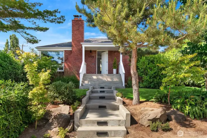 Lovely landscaped grounds welcome you to your new home in the ever popular Magnolia neighborhood.