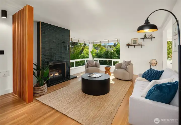 The main level of the home features a roomy living room, a dining room, delightful kitchen, access to the back deck, 2 bedrooms along with a full bath.